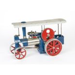 A Wilesco Live Steam Tablet-Fired Traction Engine, finished in blue/red with grey canopy, complete