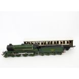 A Repainted Bassett-Lowke Gauge 1 Dining Saloon and Scratchbuilt Wooden Locomotive, the coach almost