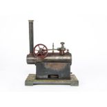 A Carette Live-Steam Over-Type Engine, with 2" diameter flywheel, single-cylinder engine with