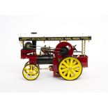 A Wilesco Live Steam Tablet-fired D409 Showman's Traction Engine, in red/black/yellow 'T Pettigrove'