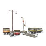 A Collection of Early Issmayer O Gauge Train Components, including a clockwork mechanism, assorted