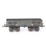 An Early Gauge 1 Bogie Coal Wagon by Bing, with pre-1908-type couplers (both loosely attached) and