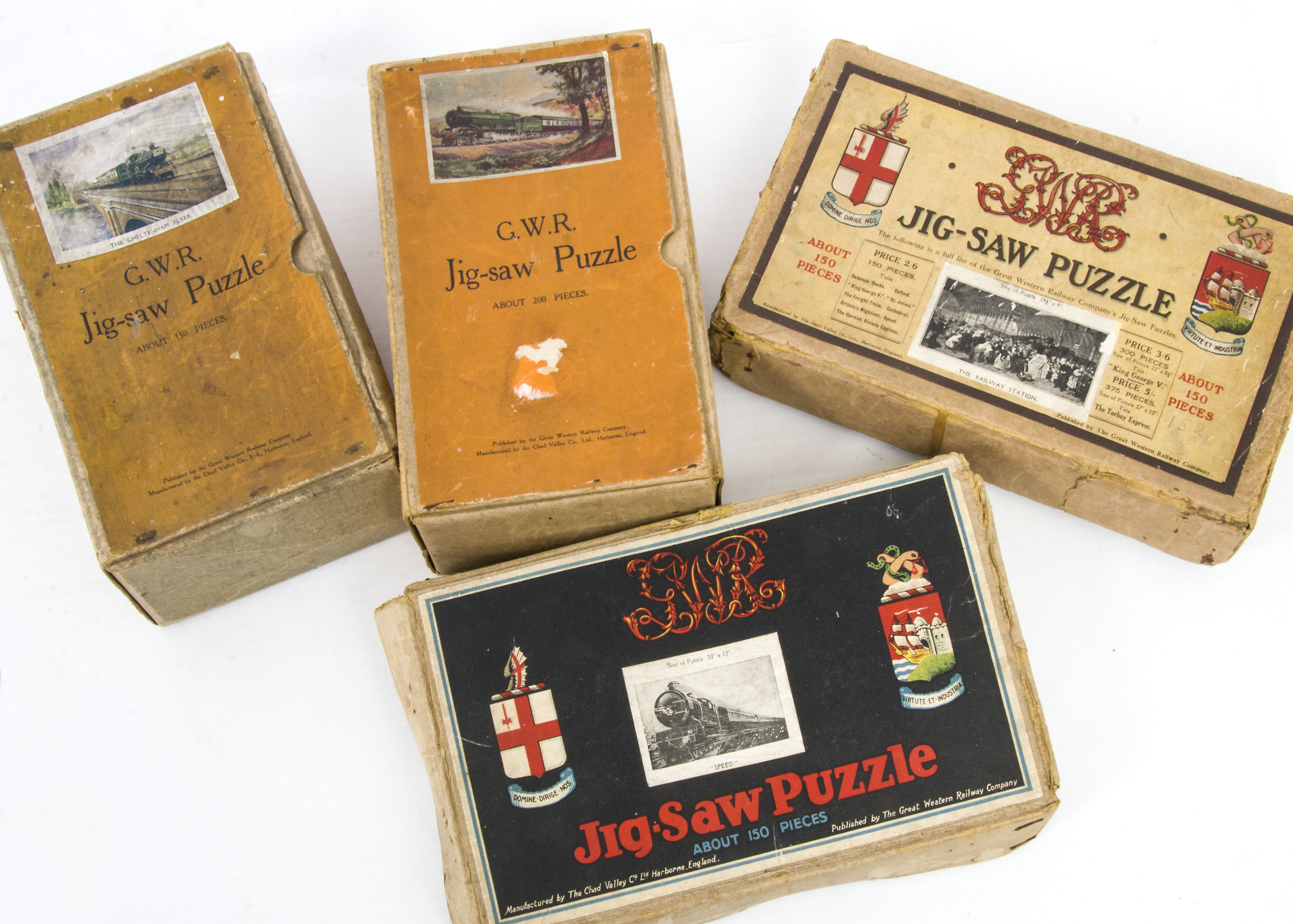 Chad Valley Jigsaws, a group of twelve GWR jigsaws in original boxes, four depicting trains, '