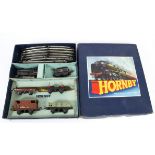 A Hornby O Gauge Clockwork No 50 Goods Train Set, containing BR black 0-4-0 Locomotive no 60199