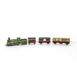 Penny Toy Train and unrelated Carriages and truck, green Engine with attached Tender similar to