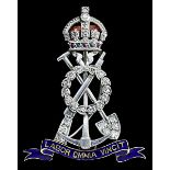 Royal Pioneer Corps In platinum, gold, diamonds, emeralds, rubies and enamels, a rifle, pick a...