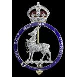 The Royal Warwickshire Regiment In platinum, gold, diamonds and enamels, an antelope statant,...