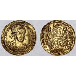 Honorius (393-423), AV Solidus, 4.36g, Constantinople, officina b, diademed and helmeted bust t...