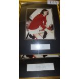 George Best, Autographs, Manchester Utd, a framed display, a magazine picture, with the signature of