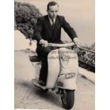 JOHN SURTEES AUTOGRAPH A signed 8" X 6" Press photograph of Surtees on a moped before the 1958