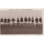 BURNLEY 1913-14 Burnley team group postcard 1913-14 showing players standing in line on the pitch.