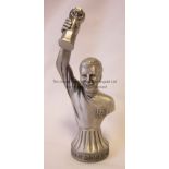 BOBBY MOORE A 5" pewter bust of Bobby Moore holding up the Jules Rimet Trophy. Good