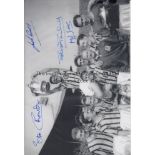 ASTON VILLA 1957 B/W 12” x 8” photo, showing Aston Villa players celebrating with the FA Cup after