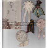 JAMES WILSON Collection of four ribbons and rosettes, also includes postcard of Arthur Shrubb who