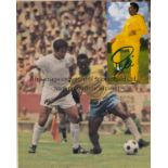 PELE AUTOGRAPH A signed 5" X 2.5" colour photo of Pele in yellow training kit which has been mounted