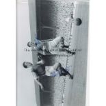 KEN BROWN & LOUIS BIMPSON B/W 12” x 8” photo, showing West Ham’s Ken Brown chasing down Liverpool’