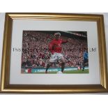 DAVID BECKHAM AUTOGRAPH A 18" X 14" framed and glazed mount with a signed colour photograph of David