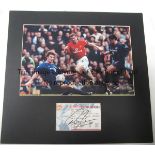 ROY KEANE AUTOGRAPH A 15" x 14" mount including a colour photograph of Keane in action for