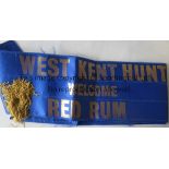 RED RUM Royal Blue Neck Sash with tassles , printed in gold with "West Kent Hunt welcomes Red