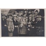 1923 CUP FINAL - BOLTON Postcard showing Bolton players in civilian clothes holding the FA Cup,