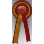 RED RUM ROSETTE Rosette in Red Rum racing colours marked Doncaster 1977 Winner. Red Rum retired in