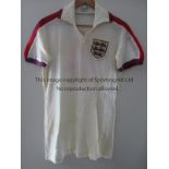 COLIN BELL - ENGLAND Colin Bell match worn white England shirt, number 4 in red on reverse, made