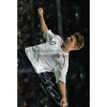 STEVEN GERRARD AUTOGRAPH A signed 12" X 8" photograph of Gerrard in England action. Good