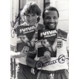 CYRILLE REGIS AND GLENN HODDLE AUTOGRAPHS A signed 9" X 7" b/w Press photograph signed by both