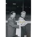 DENIS LAW 1960 B/w 12 x 8 photo, showing club captain Ken Barnes draping a Manchester City shirt