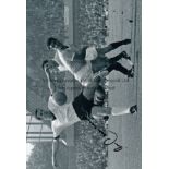 BECKENBAUER Black and white signed photograph , 12" x 8" showing Beckenbauer playing for West