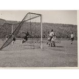 NORTH - SOUTH 1943 Press photograph showing match action from the game between Arsenal and Blackpool