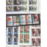 FOOTBALL STAMPS A collection of sheets including 4 X 20 stamp sheets relating to Manchester United