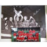 BOBBY CHARLTON / DENIS LAW / NOBBY STILES AUTOGRAPHS A 28" X 21" signed canvas black & white print