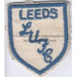 LEEDS UNITED Small cloth badge , blue and white , with "Leeds" in blue below a blue border on