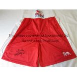 JOE FRAZIER AUTOGRAPH A pair of red Lonsdale boxer shorts signed "Smokin Joe Frazier" At the