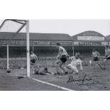 DENIS LAW 1963 B/W 12 x 8 photo, showing Man United’s Denis Law scoring the winning goal against