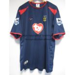 DIOMANSY KAMARA / PORTSMOUTH / PLAYER ISSUE SHIRT A dark blue with red trimmings, short sleeve shirt