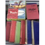 A collection of 8 Biggles annuals and a puzzle.