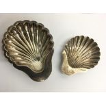 Two shell shaped dishes, one hallmarked silver.App