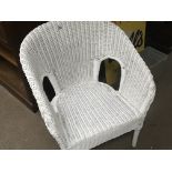 A White painted Lloyd Loom type chair.