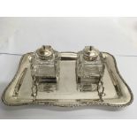 A silver inkstand fitted with two square crystal i