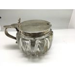 A Victorian silver mounted glass mustard pot with