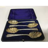 A set of Four Silver burry spoons parcel gilt, in