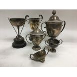 A collection of six silver trophy cups, various ha