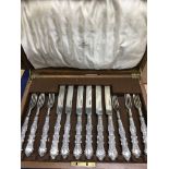 A cased set of silver cutlery.