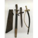 A bayonet and two other knives