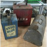 Three old petrol cans