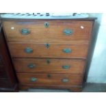 A four drawer mahogany military style chest of dra