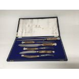 A Mappin and Webb cased six piece horned carving s