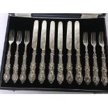 A cased set of Victorian silver fruit knifes and f